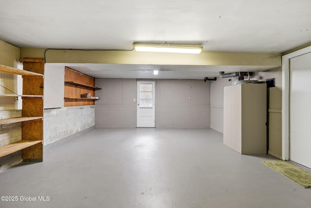 below grade area with concrete block wall