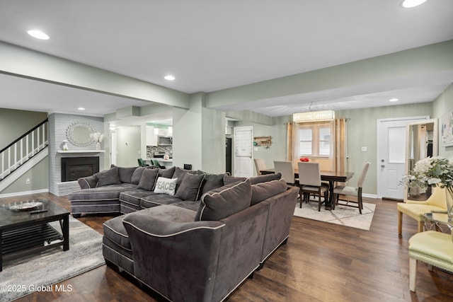 1094 Deforest St, Rotterdam, NY 12303 - living area featuring a fireplace, dark wood-type flooring, recessed lighting, baseboards, and stairs