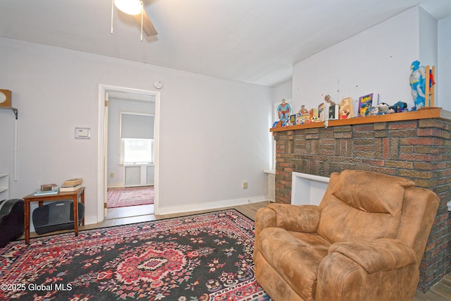 1823 8th St, Rensselaer, NY 12144 - sitting room featuring baseboards, a ceiling fan, and wood finished floors