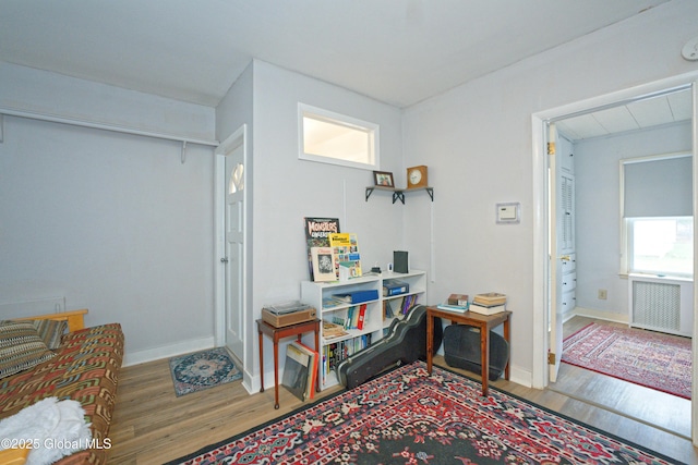 1823 8th St, Rensselaer, NY 12144 - interior space with radiator, baseboards, and wood finished floors