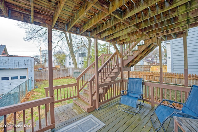 1823 8th St, Rensselaer, NY 12144 - deck featuring a fenced backyard, an outdoor structure, and stairway