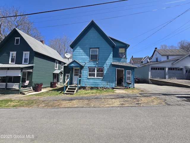 view of front of home with an outbuilding