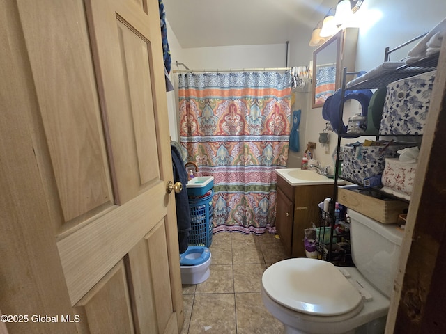 full bath featuring vanity, toilet, tile patterned flooring, and curtained shower