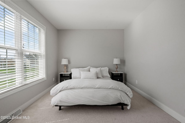 6 Gorsline Dr, Halfmoon, NY 12118 - bedroom with visible vents, baseboards, light colored carpet, and multiple windows