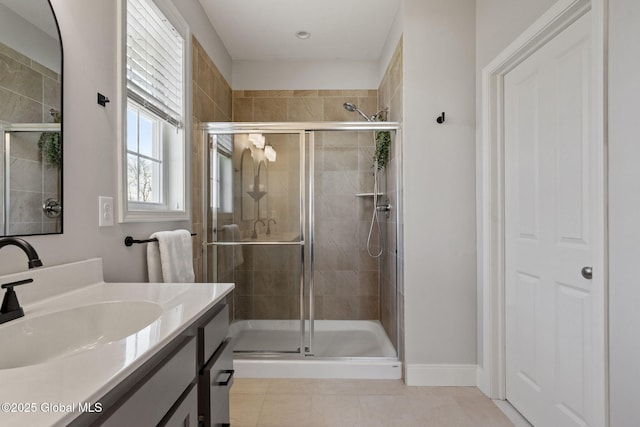6 Gorsline Dr, Halfmoon, NY 12118 - full bathroom featuring baseboards, vanity, tile patterned floors, and a stall shower