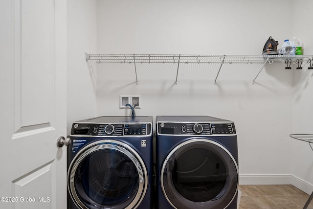 6 Gorsline Dr, Halfmoon, NY 12118 - clothes washing area featuring washing machine and dryer, baseboards, and laundry area