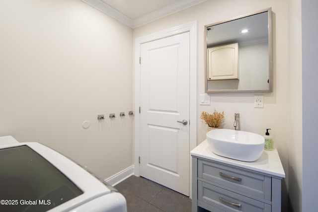 bathroom featuring recessed lighting, tile patterned floors, vanity, crown molding, and washer / clothes dryer