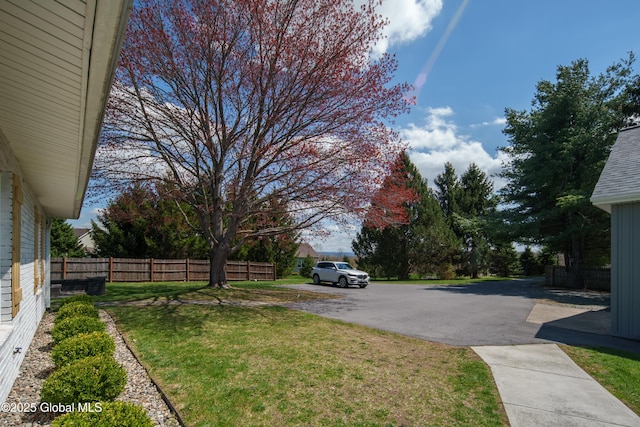 view of yard with fence