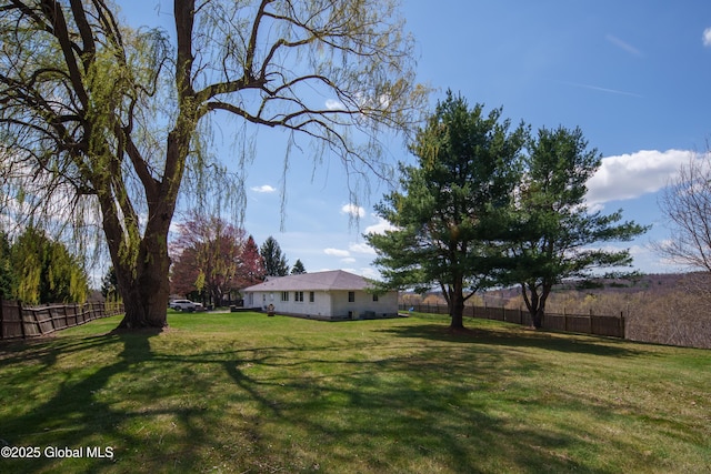 view of yard featuring fence
