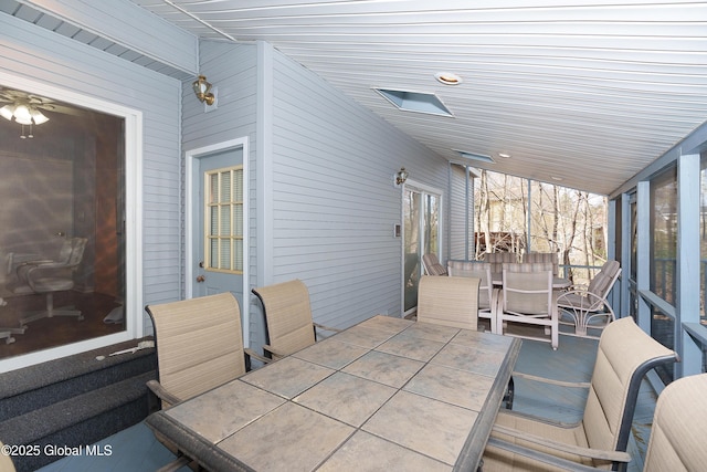 view of patio / terrace featuring french doors and outdoor dining space