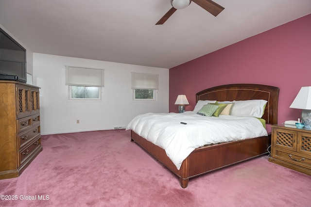 bedroom with baseboards, ceiling fan, carpet flooring, and visible vents