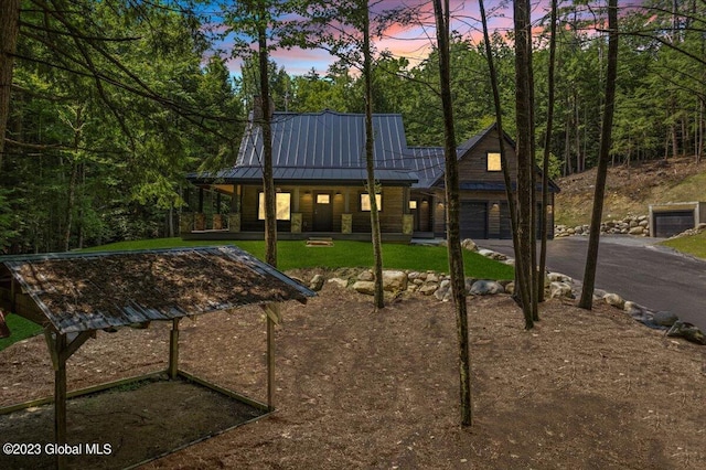 1181 Hunt Lake Rd Unit N, Corinth, NY 12822 - exterior space with driveway and a garage