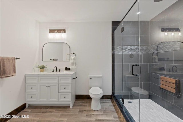 1181 Hunt Lake Rd Unit N, Corinth, NY 12822 - bathroom with a shower stall, toilet, and vanity