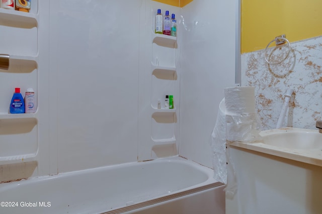 bathroom with vanity and shower / tub combination