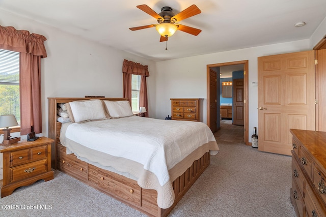 2694 State Route 10, Summit, NY 12175 - bedroom with multiple windows, light carpet, a ceiling fan, and ensuite bathroom