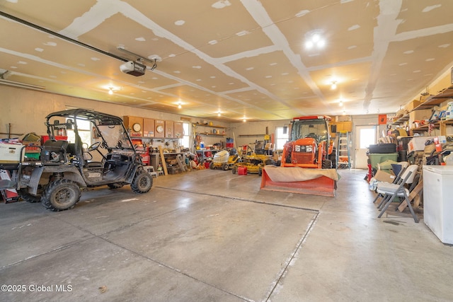 2694 State Route 10, Summit, NY 12175 - garage with a workshop area and a garage door opener