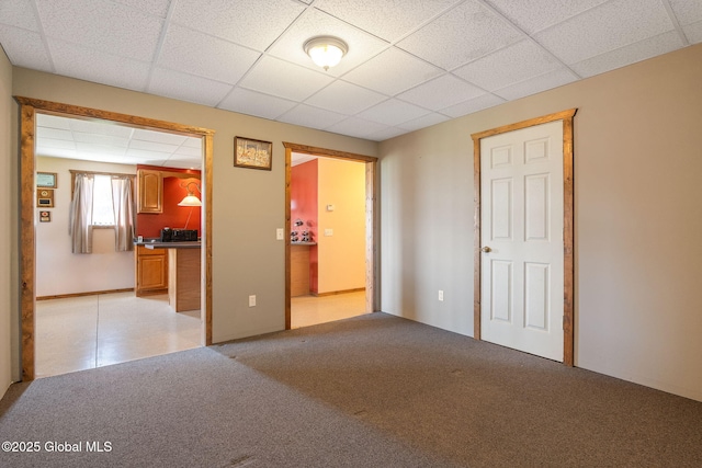 2694 State Route 10, Summit, NY 12175 - spare room featuring a paneled ceiling and light colored carpet