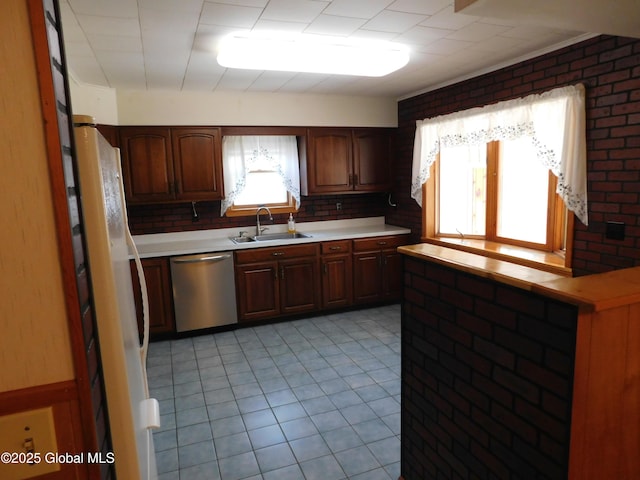 6 Riverview St, South Glens Falls, NY 12803 - kitchen featuring light countertops, a sink, freestanding refrigerator, dishwasher, and light tile patterned floors
