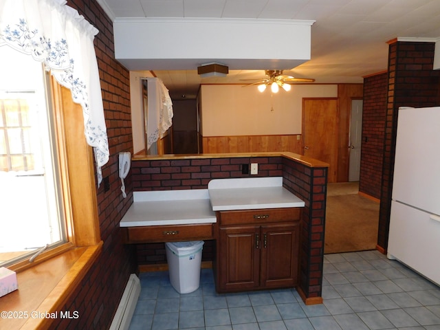6 Riverview St, South Glens Falls, NY 12803 - bathroom with a baseboard heating unit, tile patterned floors, a wainscoted wall, ceiling fan, and wooden walls