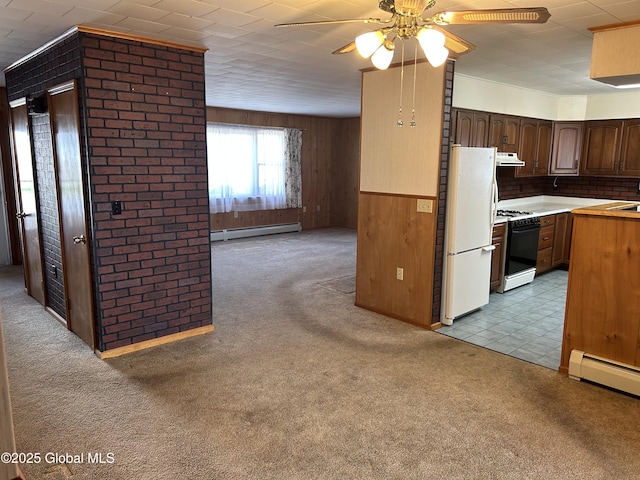6 Riverview St, South Glens Falls, NY 12803 - kitchen featuring light carpet, freestanding refrigerator, range with gas stovetop, a ceiling fan, and a baseboard radiator