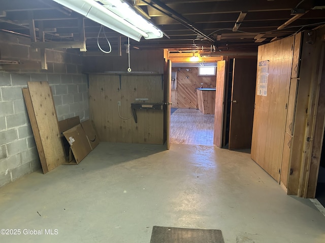 6 Riverview St, South Glens Falls, NY 12803 - unfinished below grade area featuring wooden walls and concrete block wall