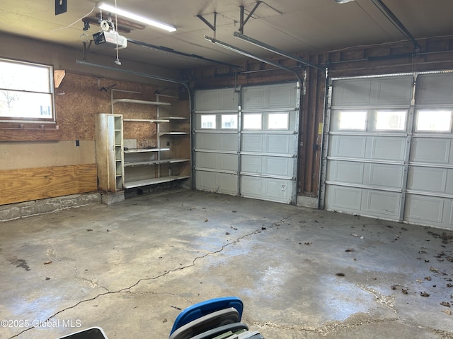6 Riverview St, South Glens Falls, NY 12803 - garage featuring a garage door opener