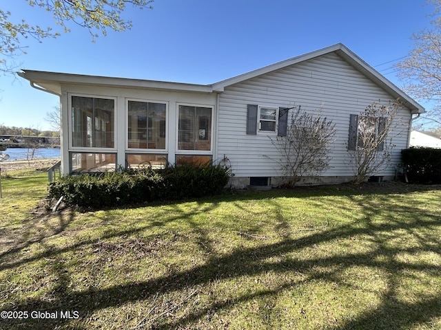 6 Riverview St, South Glens Falls, NY 12803 - view of property exterior with a lawn, a sunroom, and a water view