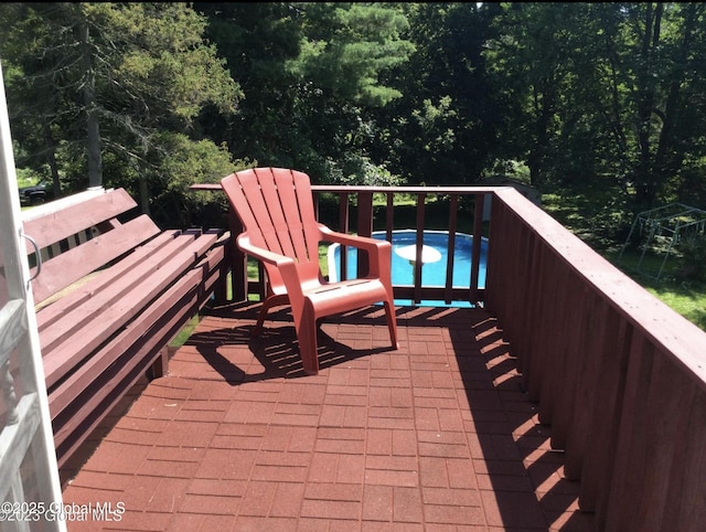deck with a pool
