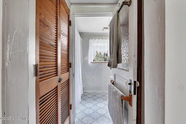 bathroom with tile patterned floors and visible vents