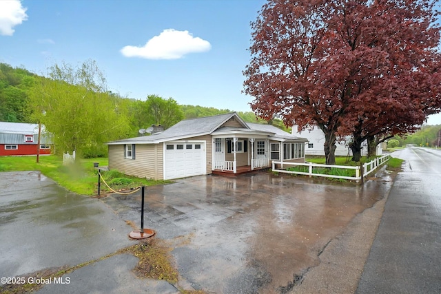 286 State Hwy Unit 80, Fort Plain, NY 13339 - ranch-style house with a garage, driveway, and a porch