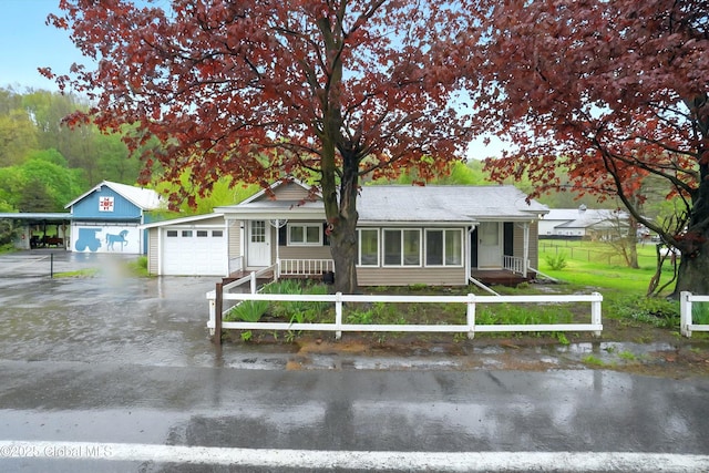 286 State Hwy Unit 80, Fort Plain, NY 13339 - single story home with a carport, an attached garage, and driveway