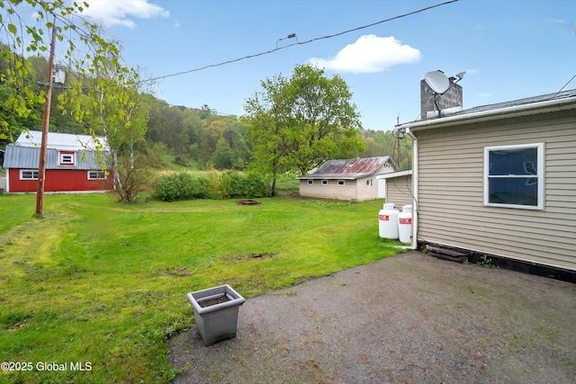 286 State Hwy Unit 80, Fort Plain, NY 13339 - view of grassy yard featuring a patio area