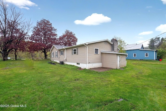 286 State Hwy Unit 80, Fort Plain, NY 13339 - view of side of home with a chimney and a yard