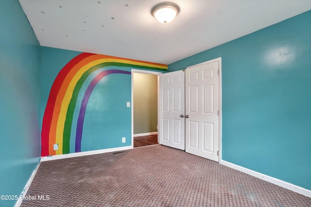 286 State Hwy Unit 80, Fort Plain, NY 13339 - unfurnished bedroom with baseboards, carpet flooring, and a closet