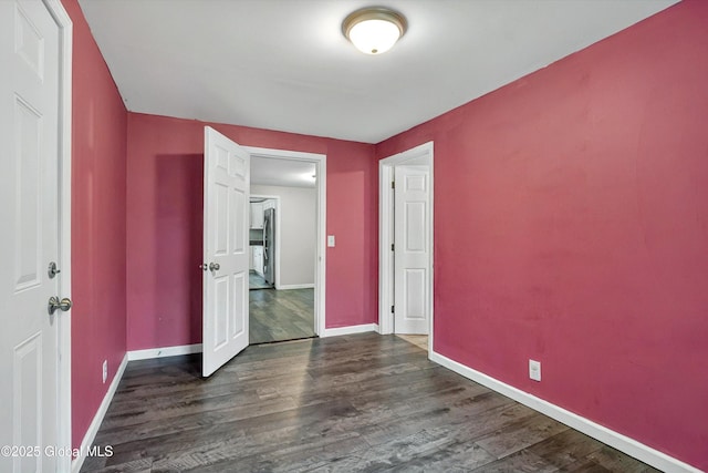 286 State Hwy Unit 80, Fort Plain, NY 13339 - unfurnished bedroom with dark wood-type flooring and baseboards