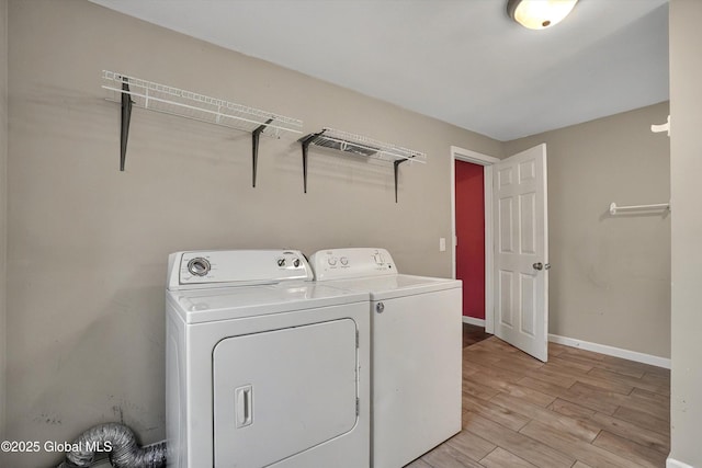 286 State Hwy Unit 80, Fort Plain, NY 13339 - laundry area featuring separate washer and dryer, light wood-style floors, and baseboards