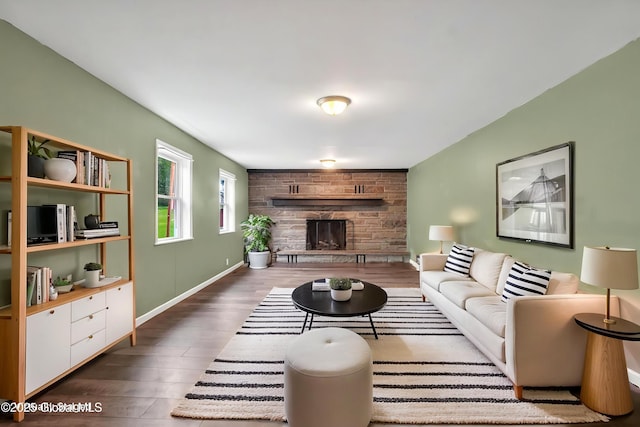 286 State Hwy Unit 80, Fort Plain, NY 13339 - living area with wood finished floors, a stone fireplace, and baseboards