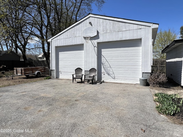 detached garage with fence