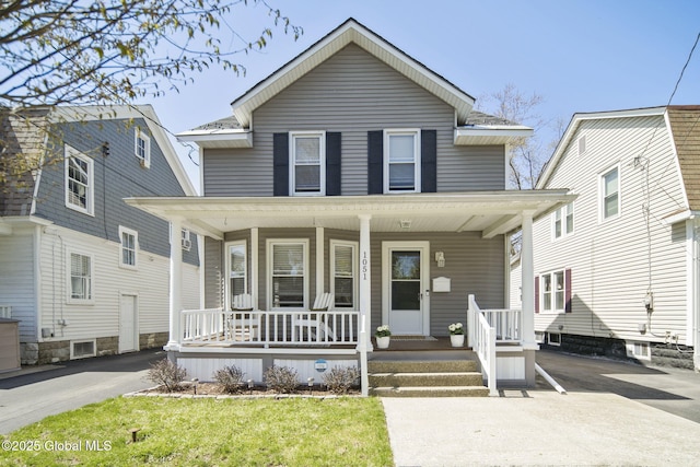 traditional-style house with a porch