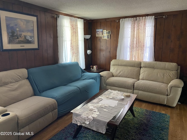 470 Middle Grove Rd, Greenfield, NY 12850 - living room featuring wood finished floors, a textured ceiling, and plenty of natural light