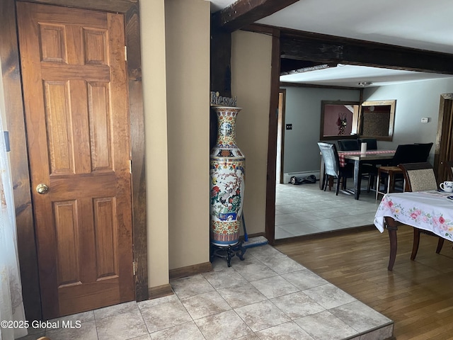 470 Middle Grove Rd, Greenfield, NY 12850 - interior space with beamed ceiling, baseboards, and light tile patterned floors