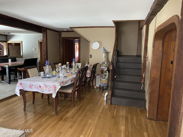 470 Middle Grove Rd, Greenfield, NY 12850 - dining space with light wood-style flooring and stairway