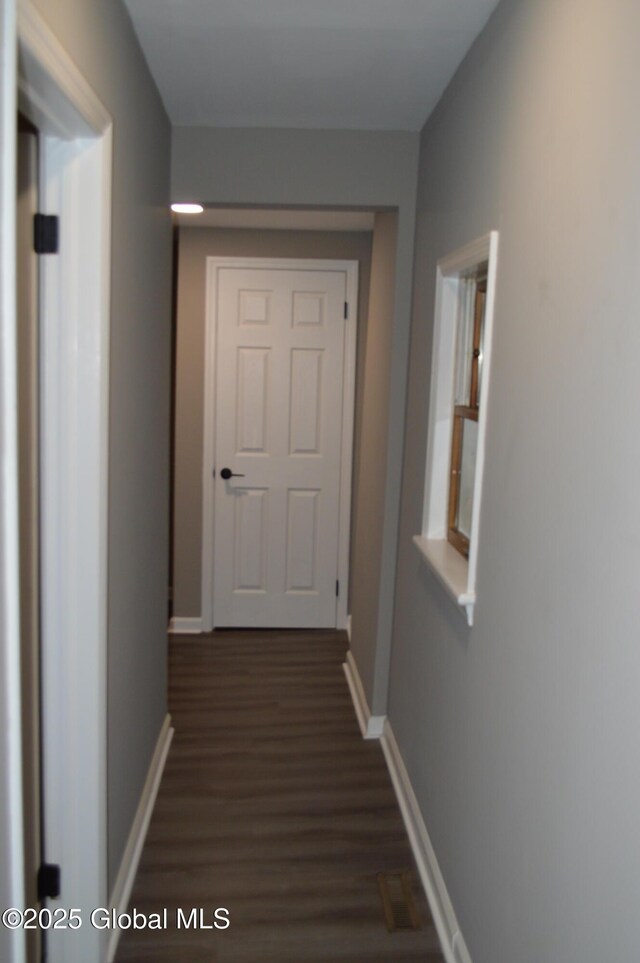 178 Spring St, Albany, NY 12203 - hallway featuring baseboards and dark wood-style flooring