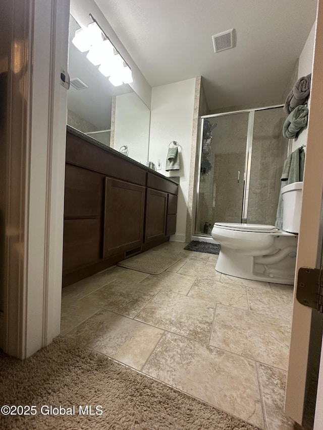 37 Nantucket St, Colonie, NY 12047 - full bathroom with stone tile floors, a stall shower, toilet, and vanity