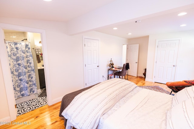 99 Wilsey Rd, Greenfield, NY 12833 - bedroom featuring ensuite bath, baseboards, recessed lighting, and light wood-style floors