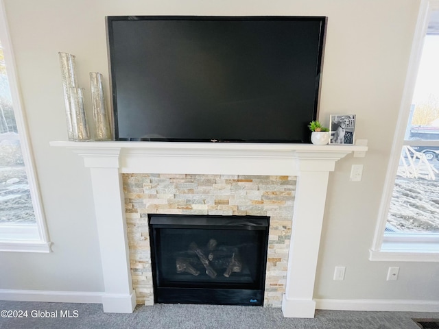 10 Hunter Ct, Milton, NY 12020 - details with baseboards, visible vents, and a glass covered fireplace