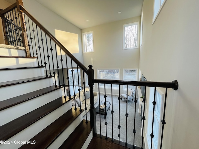 10 Hunter Ct, Milton, NY 12020 - staircase featuring a towering ceiling and baseboards