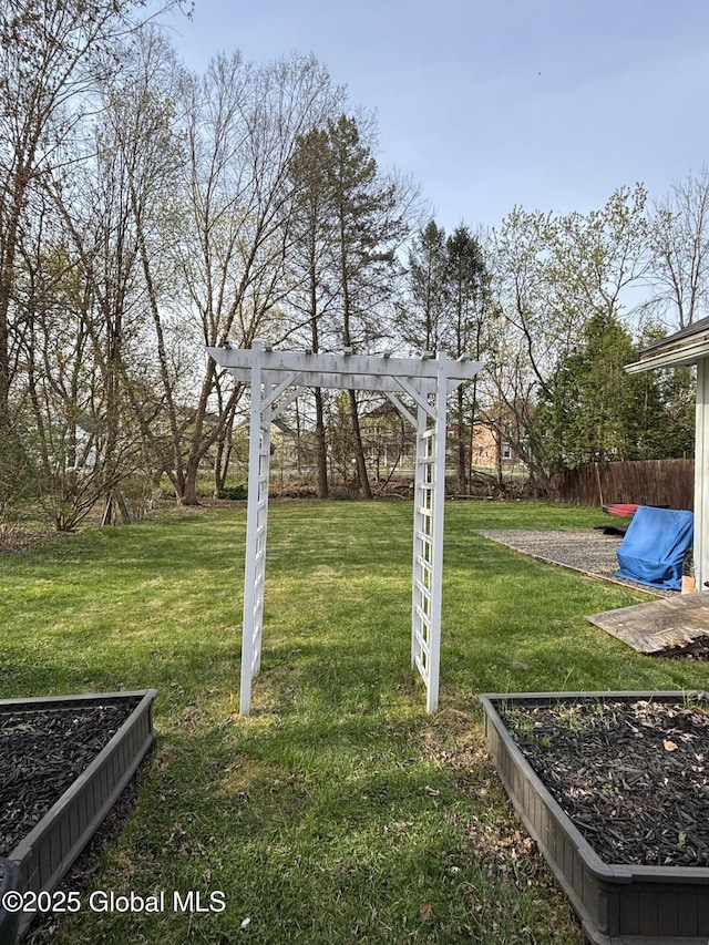 view of yard featuring fence