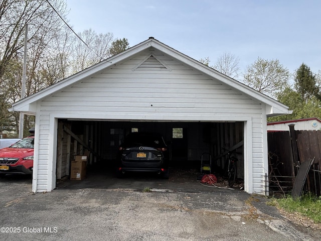 detached garage with fence