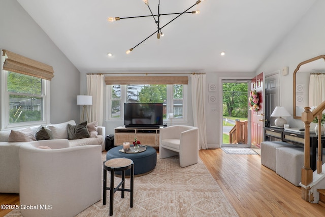 21 St Charles Pl, Saratoga Springs, NY 12866 - living area with vaulted ceiling, light wood-type flooring, a chandelier, and recessed lighting